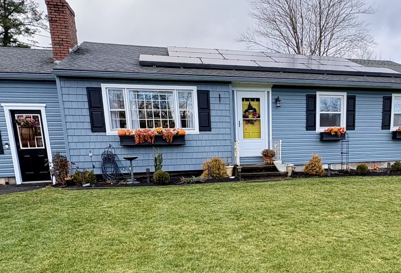 A combination of dutch-lap, clapboard and cedar shake shingles
